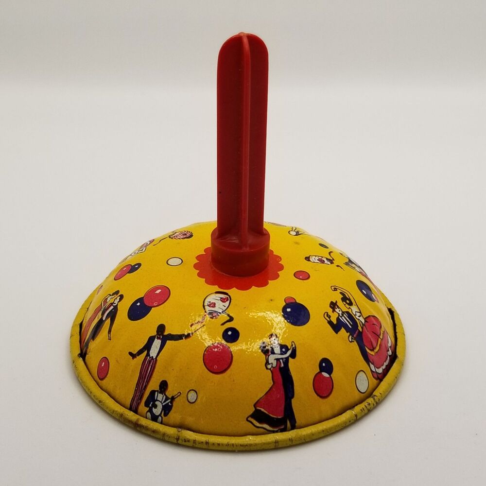 Vintage US Metal Toy Company tin art litho noisemaker bell style New Years theme